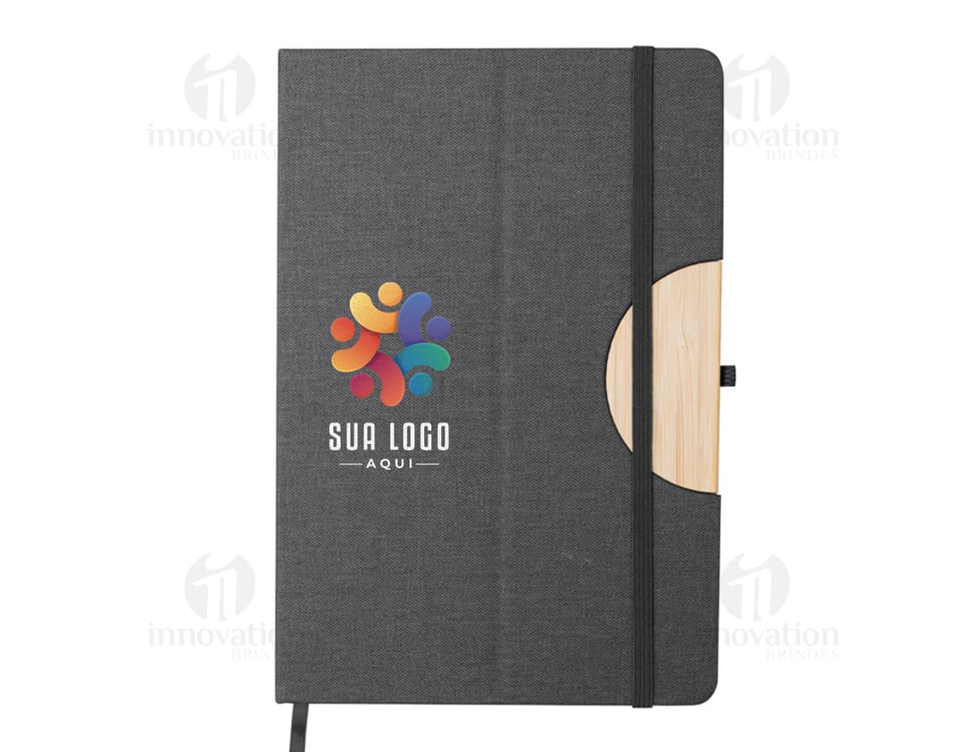 Kit de escritório contendo notebook, equipamento tecnológico, objetos diversos, telefone celular, produtos de maquiagem