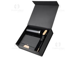 Kit de escritório contendo notebook, equipamento tecnológico, objetos diversos, telefone celular, produtos de maquiagem