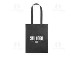 SACOLA 270 x 350 mm amarela com design fashion em uma boutique de shopping, protegida por um cadeado e etiqueta de segurança.