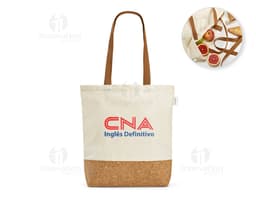 Sacola de compras feita de 70% algodão reciclado, com textura marrom de juta, vazia e sem ninguém perto. Na sacola há pão