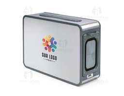 Caixa de som 15.600 mAh de cor preta com design compacto e moderno. Na frente da caixa, há botões de controle de volume e