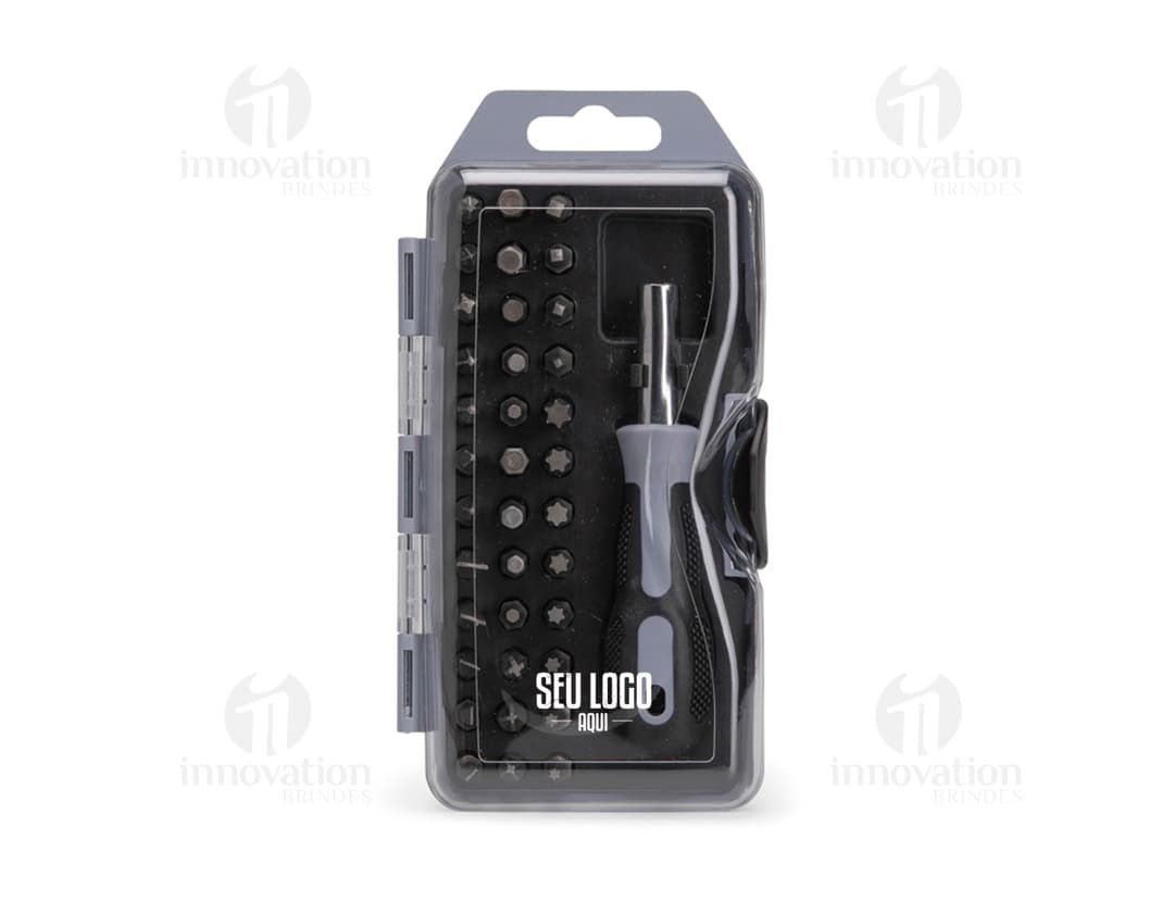Kit de ferramentas de 37 peças em um telefone celular moderno, com teclado, tela e botões pretos. O equipamento de