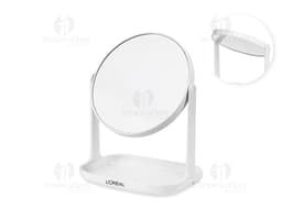 Espelho de mesa plástico em um ambiente de escritório moderno, ao lado de um mouse de computador e um teclado. A superfície