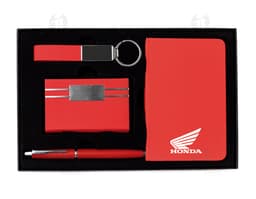 Kit Executivo 4 Peças em preto e amarelo, com ícones de notebook, diskette, ícone de pasta e ícone de mensagem em destaque.