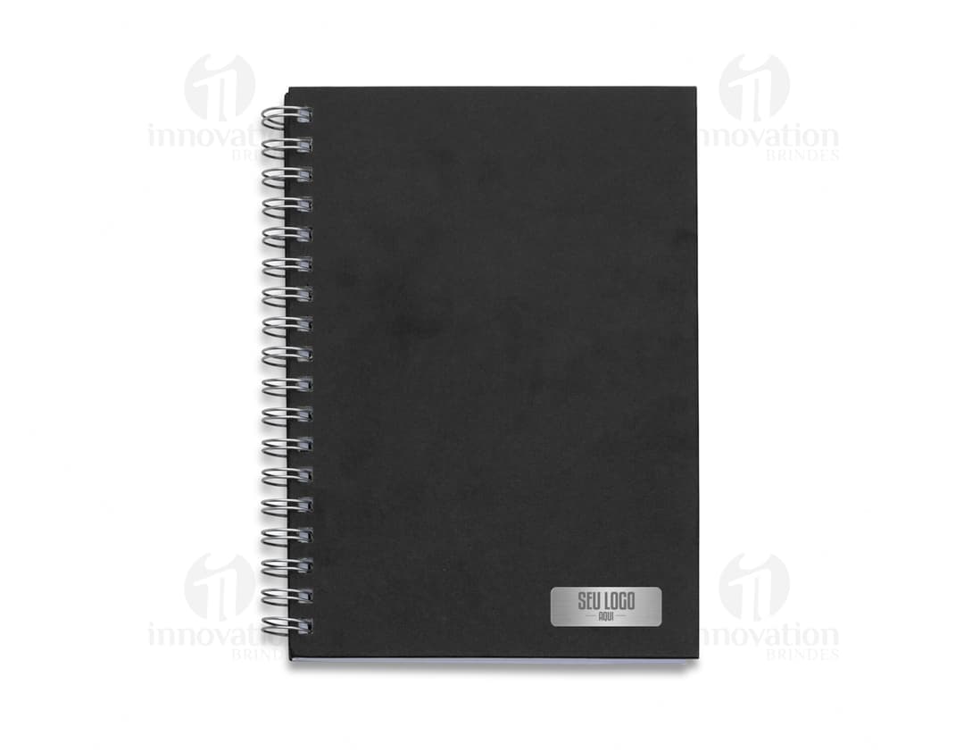 Caderno em couro sintético com espiral, ideal para suas anotações e organização diária. Perfeito para uso educacional e