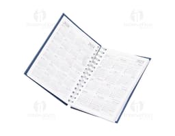 Agenda diária 2025 Wire-o com capa dura na cor preta e detalhes em dourado, apresentando páginas internas decoradas com