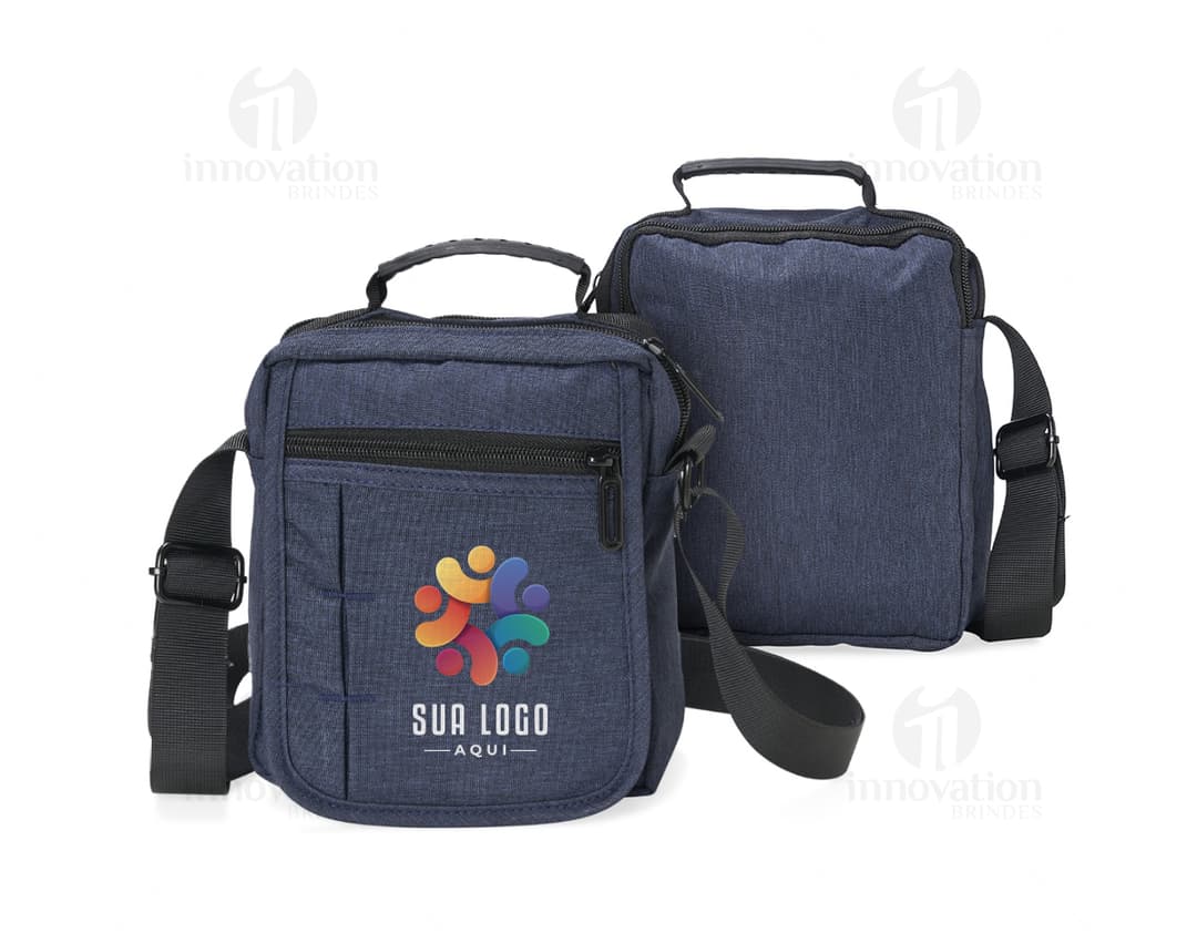 Bolsa de ombro de couro preto com alça, zíper e diversos compartimentos. Ideal para viagens de negócios, viagens a lazer ou
