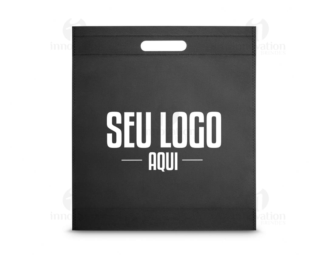 Envelope de papel em branco dentro de um container, sobre um papel de carta decorado, com um design vintage e bordas