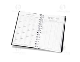 Agenda diária para o ano de 2025, capa com design elegante e organização por dias e horas.