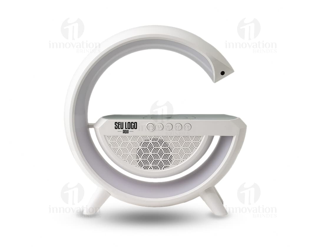 Caixa de som com carregador por indução é um aparelho metálico de alta tecnologia que conta com um design moderno e