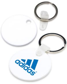 Chaveiro acrílico redondo - O acessório perfeito para adicionar estilo e segurança às suas chaves. Design exclusivo em forma de símbolo de negócios, garantindo proteção e organização. Ideal para empresas e eventos corporativos. Adquira já o seu!