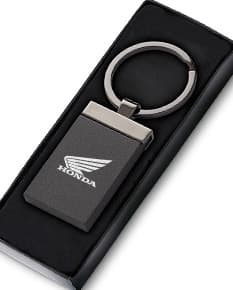 Chaveiro de liga preto para uso diário, com design moderno e funcional. Feito de couro e metal, perfeito para armazenar