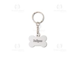 Chaveiro de metal decorado com correntes, algema, cadeado, chave e outros elementos em metal preciosos, como ouro e prata. O