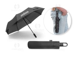Guarda-chuva dobrável preto em formato de capelo de formatura, simbolizando sucesso e educação. O objeto 3D está aberto e