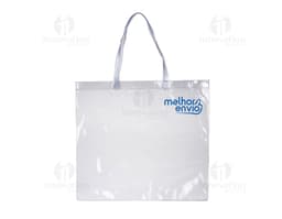 Sacola plástica transparente e elegante, com alça de couro e fecho de metal. Ideal para embalagem de presentes e compras em