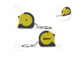 Chaveiro Trena Plástico 1 Metro: Chaveiro em forma de trena de plástico com um metro de comprimento.